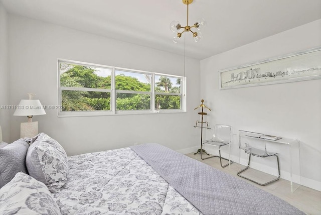 bedroom featuring baseboards