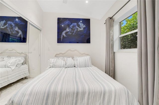 bedroom with vaulted ceiling