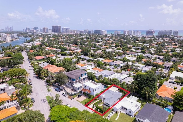 bird's eye view with a view of city and a water view