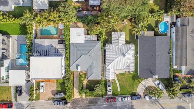 birds eye view of property with a residential view