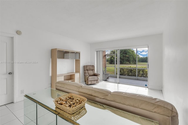 unfurnished living room featuring light tile patterned flooring