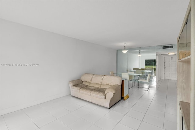 living room featuring light tile patterned floors