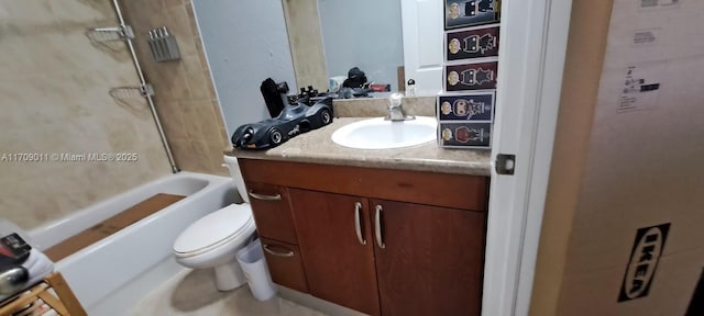 full bathroom featuring vanity, bathing tub / shower combination, and toilet