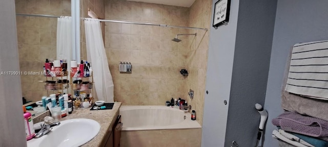 bathroom featuring vanity and shower / bath combo