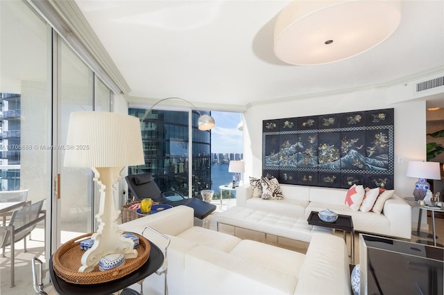 living room featuring a water view, a wall of windows, and ornamental molding