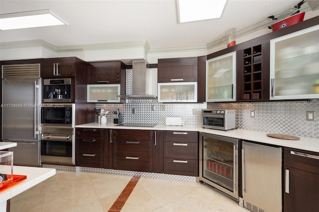 kitchen featuring wine cooler, decorative backsplash, wall chimney exhaust hood, and stainless steel appliances