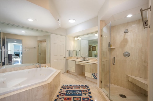 bathroom with vanity and plus walk in shower