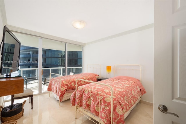 bedroom featuring floor to ceiling windows and ornamental molding