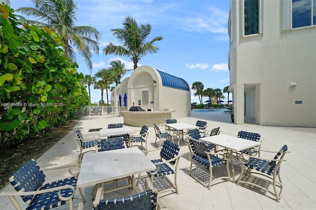 18671 Collins Ave Unit 3101, Sunny Isles Beach, FL 33160 - view of patio / terrace featuring outdoor dining area