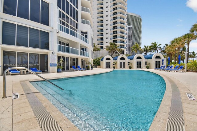 18671 Collins Ave Unit 3101, Sunny Isles Beach, FL 33160 - community pool featuring a patio area