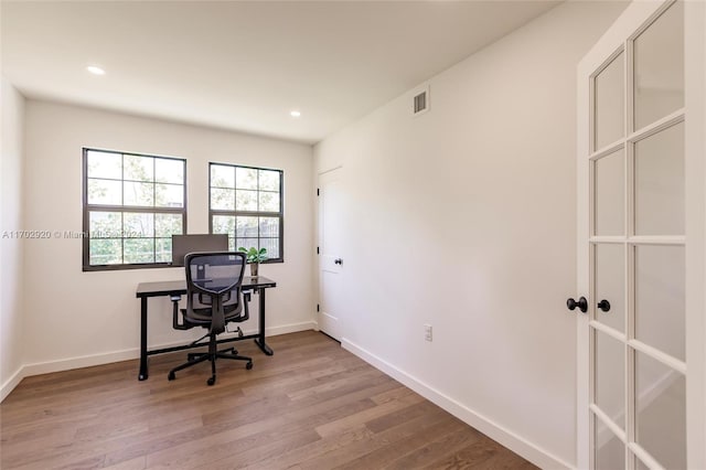 office space featuring light hardwood / wood-style flooring