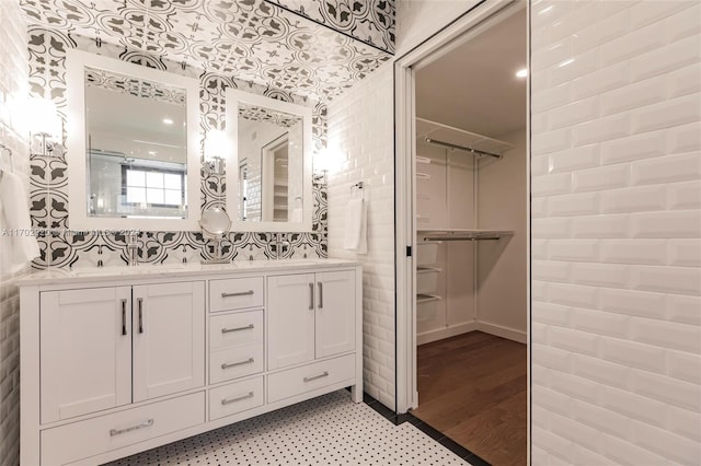 bathroom with hardwood / wood-style floors and vanity