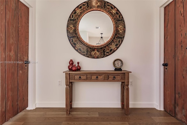 entrance foyer with dark hardwood / wood-style floors