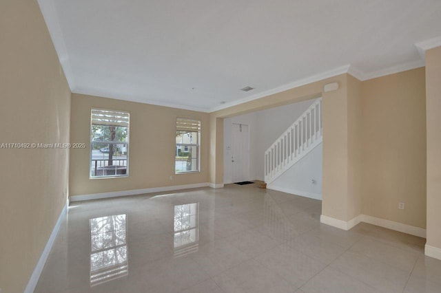 unfurnished living room featuring stairway, crown molding, light tile patterned floors, baseboards, and visible vents