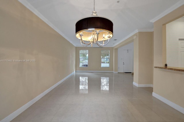 unfurnished room featuring light tile patterned flooring, crown molding, baseboards, and a notable chandelier