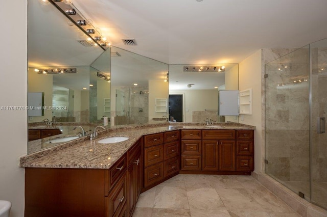 bathroom featuring vanity and walk in shower