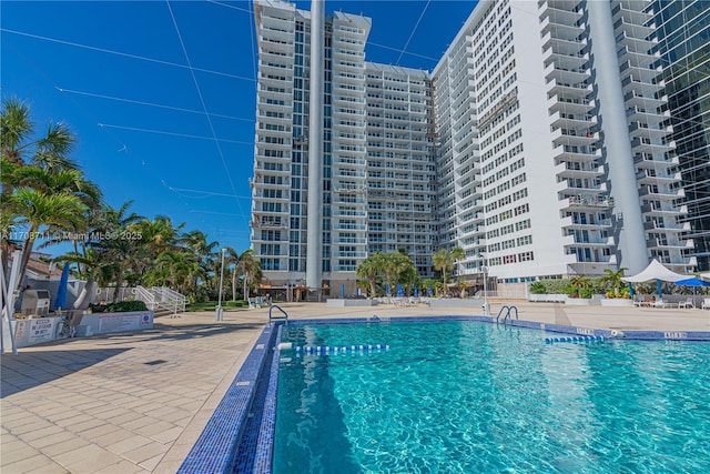 view of pool featuring a patio area