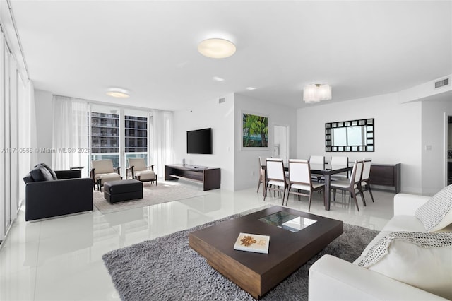 living room with light tile patterned floors