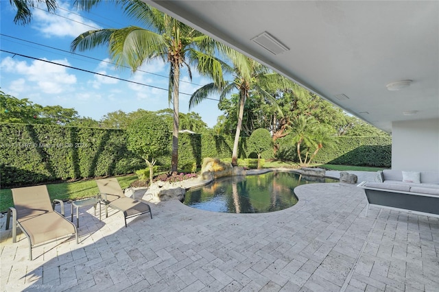 view of pool with a patio