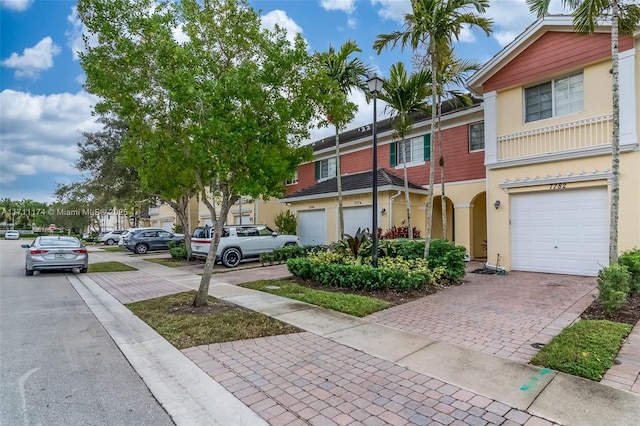 view of front of property with a garage