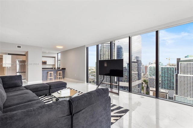 living room with floor to ceiling windows