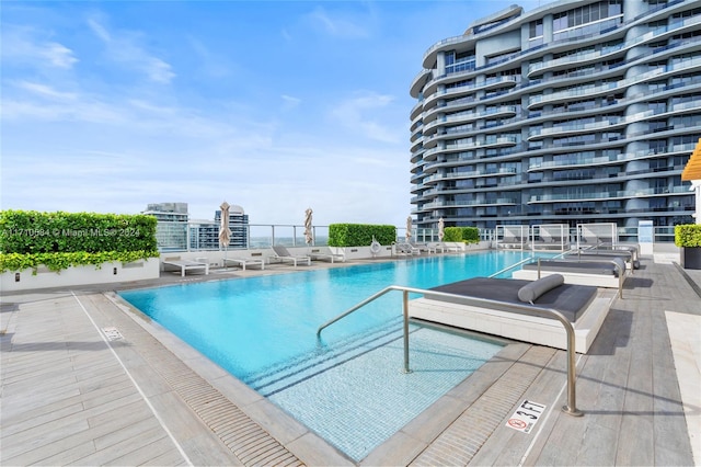 view of swimming pool with a patio area