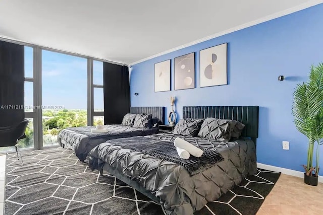 bedroom with a wall of windows and ornamental molding