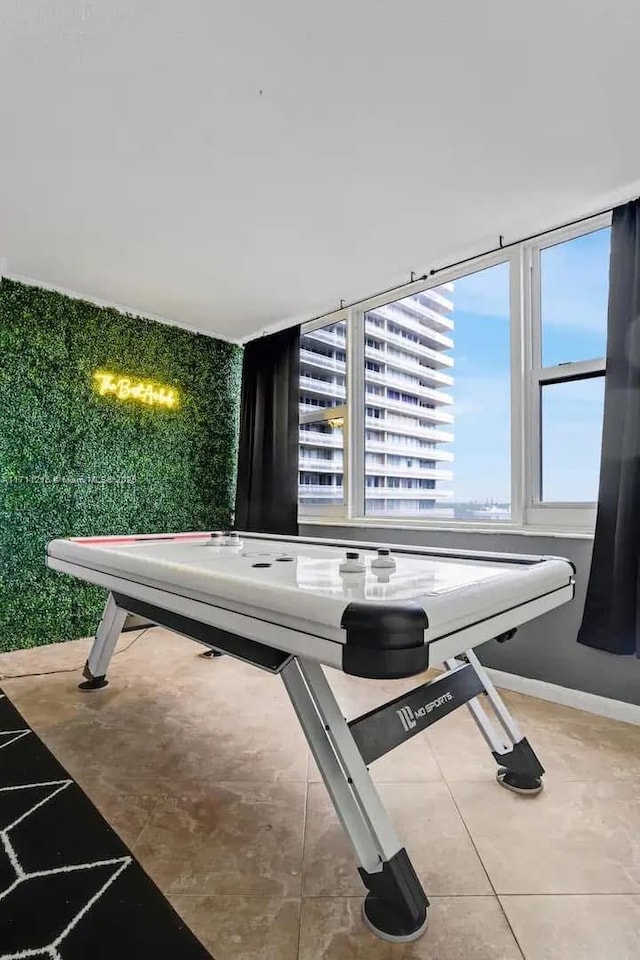 game room featuring tile patterned flooring