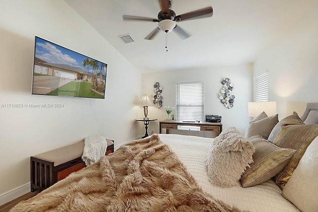 bedroom featuring lofted ceiling and ceiling fan