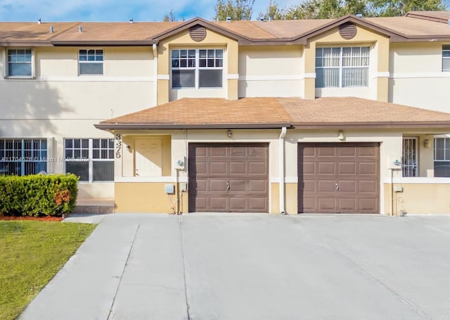 view of property featuring a garage