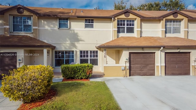 view of property featuring a garage