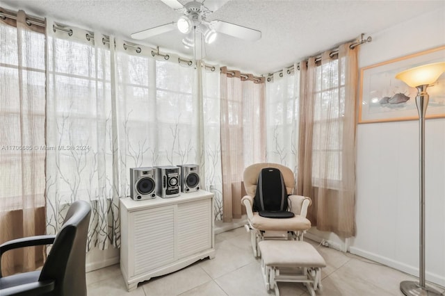 sunroom with ceiling fan