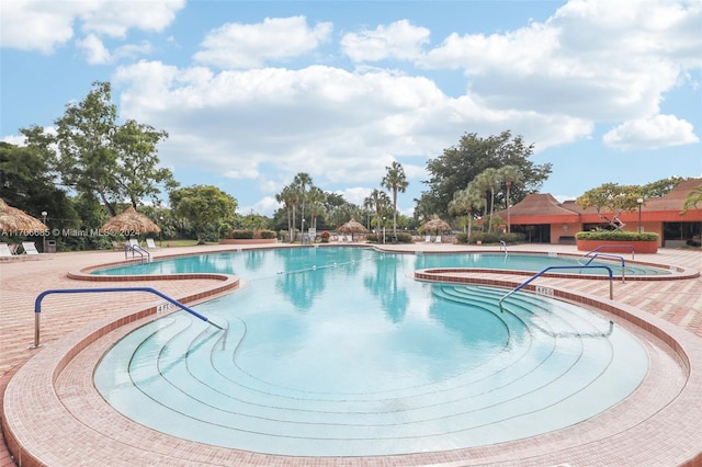 view of swimming pool with a patio area