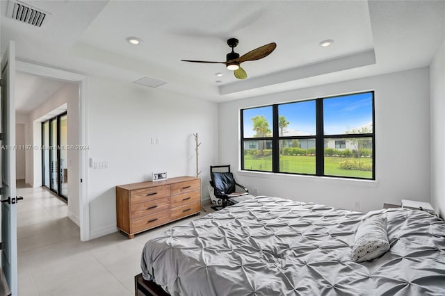 4536 N Silverwood Ln N, Oakland Park, FL 33309 - bedroom featuring a tray ceiling, baseboards, visible vents, and recessed lighting