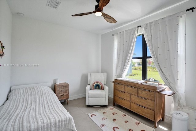 4536 N Silverwood Ln N, Oakland Park, FL 33309 - bedroom featuring baseboards, ceiling fan, and visible vents