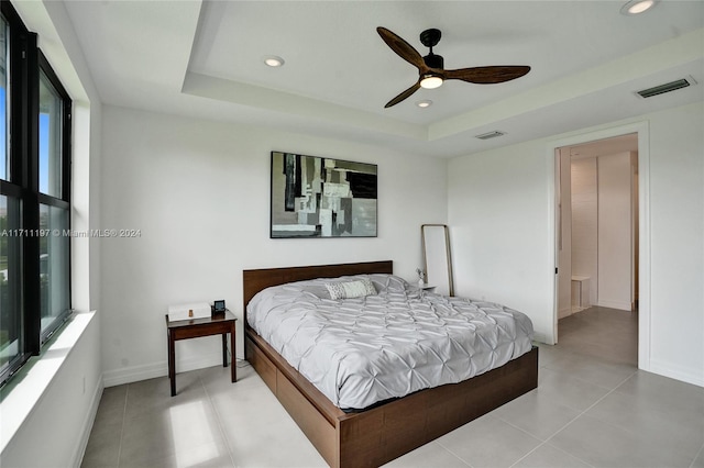 4536 N Silverwood Ln N, Oakland Park, FL 33309 - bedroom with a tray ceiling, baseboards, visible vents, and recessed lighting