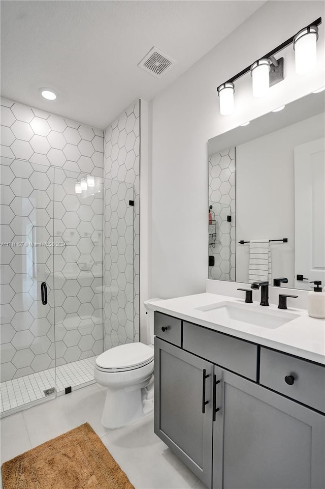4536 N Silverwood Ln N, Oakland Park, FL 33309 - full bathroom with visible vents, a shower stall, toilet, tile patterned floors, and vanity