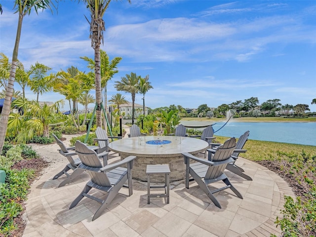 4536 N Silverwood Ln N, Oakland Park, FL 33309 - view of patio / terrace featuring a water view and outdoor dining space