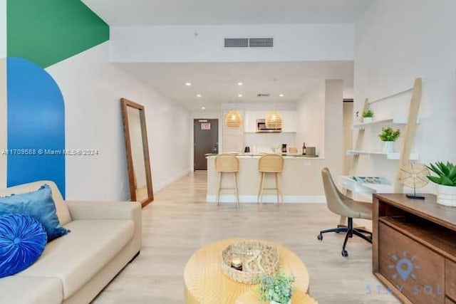 living room featuring light hardwood / wood-style flooring