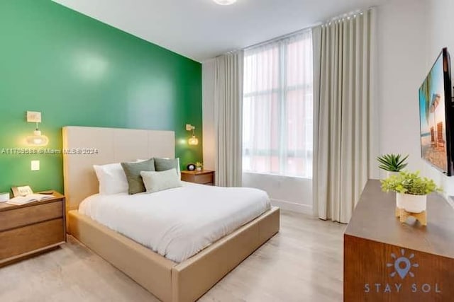 bedroom featuring light hardwood / wood-style floors