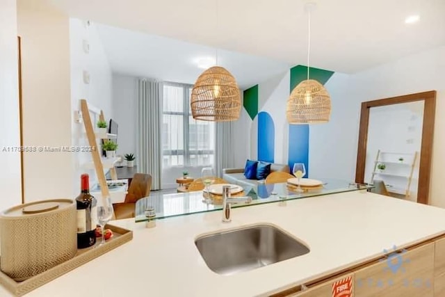 kitchen with pendant lighting and sink