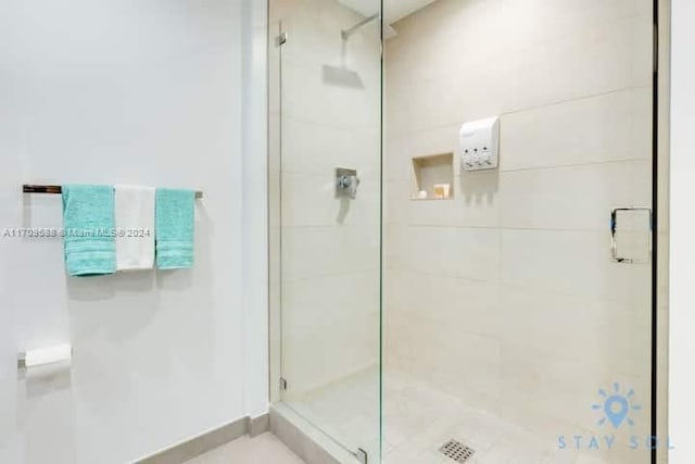 bathroom with an enclosed shower