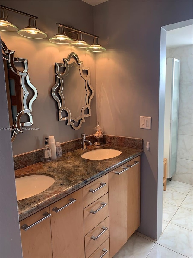 bathroom featuring tile patterned floors and vanity