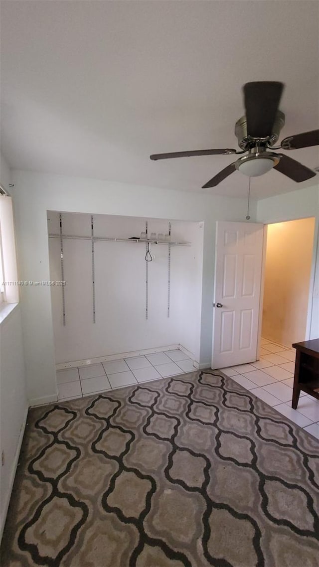 spare room featuring light tile patterned floors