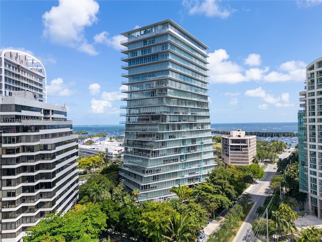 view of building exterior with a water view