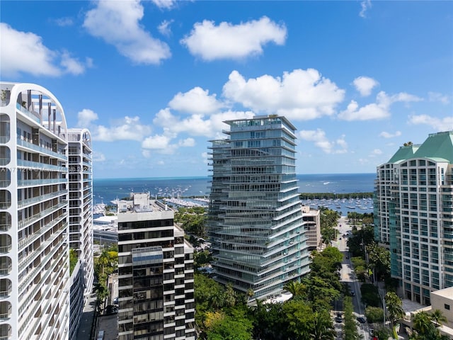 property's view of city featuring a water view