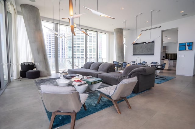 living room with floor to ceiling windows