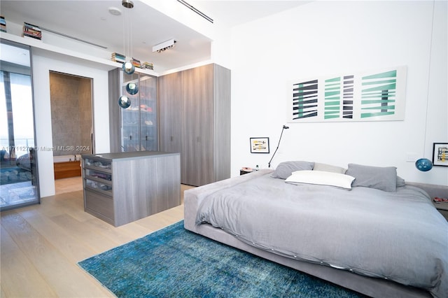 bedroom featuring light hardwood / wood-style flooring