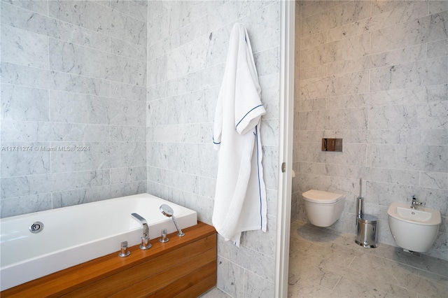 bathroom with a bathing tub, a bidet, tile walls, and toilet