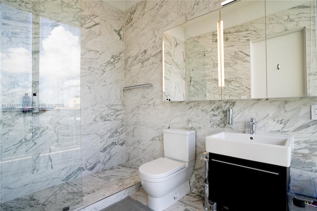 bathroom with vanity, toilet, tile walls, and a tile shower